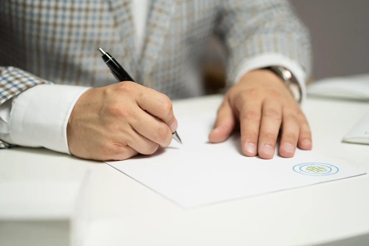 man, sign, paper, write, document, contract, signing, agreement, signature, signing document, signing contract, signing paper, sign, contract, contract, contract, contract, contract, signing, agreement, signature, signature. Distributor onboarding: the practical version