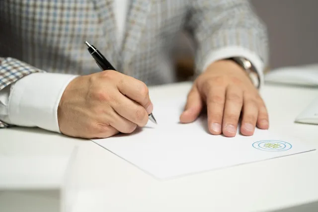man, sign, paper, write, document, contract, signing, agreement, signature, signing document, signing contract, signing paper, sign, contract, contract, contract, contract, contract, signing, agreement, signature, signature. Distributor onboarding: the practical version